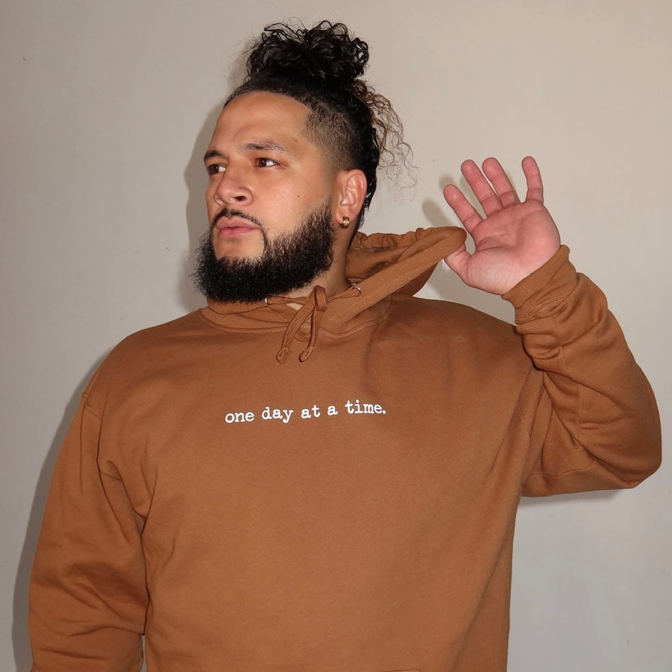 one day at a time x rust sweatshirt