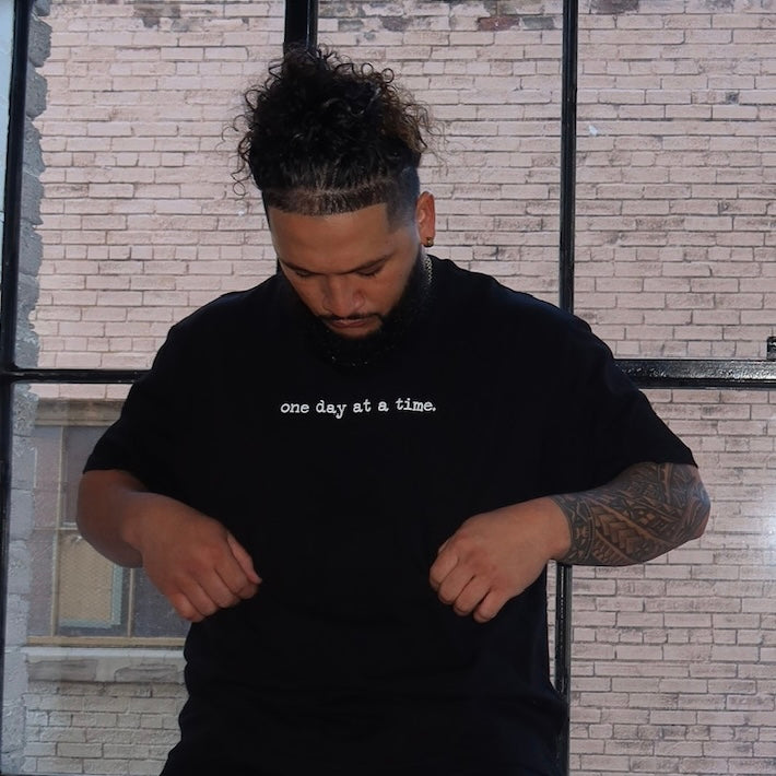 one day at a time x black t shirt